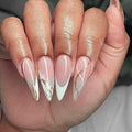 Blush Marble Glow almond press-on nails