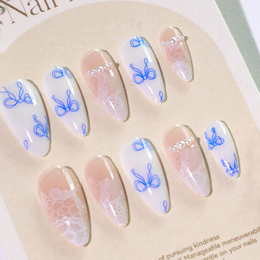 Blue Bow French medium almond press-on nails