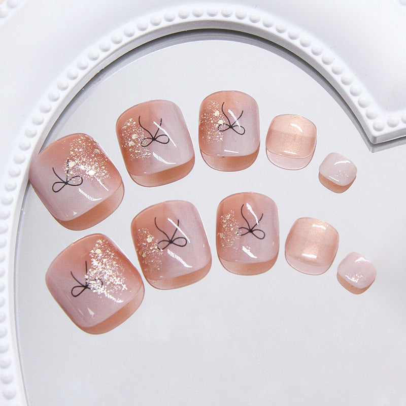Cocoa Bow Glow 24-piece press-on toenail set