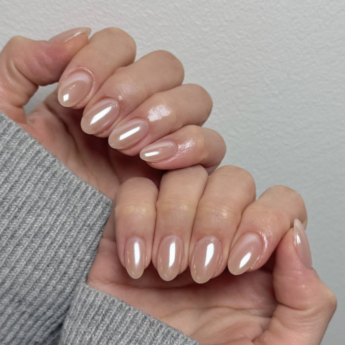 Nude Flash short almond press-on nails