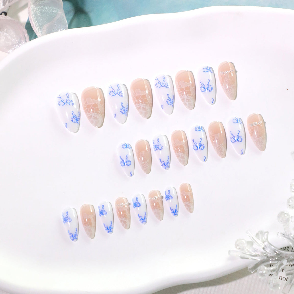 Blue Bow French medium almond press-on nails