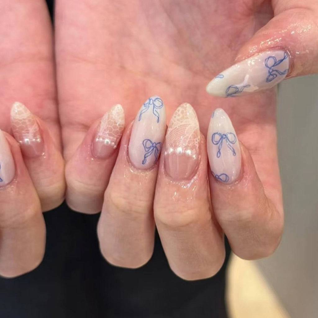 Blue Bow French medium almond press-on nails