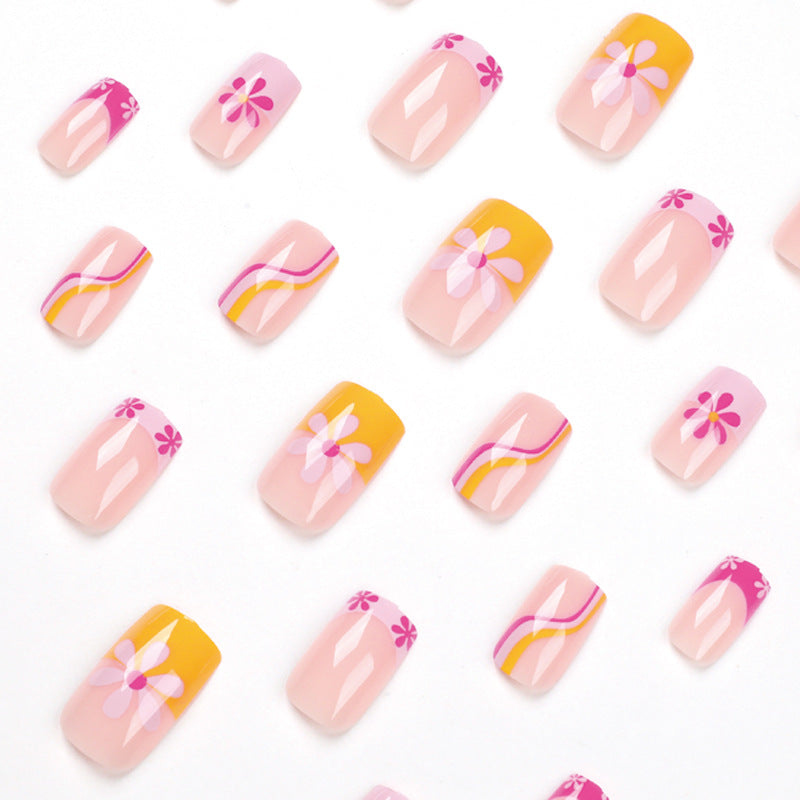 Citrus Blossom Wave medium floral French press-on nails
