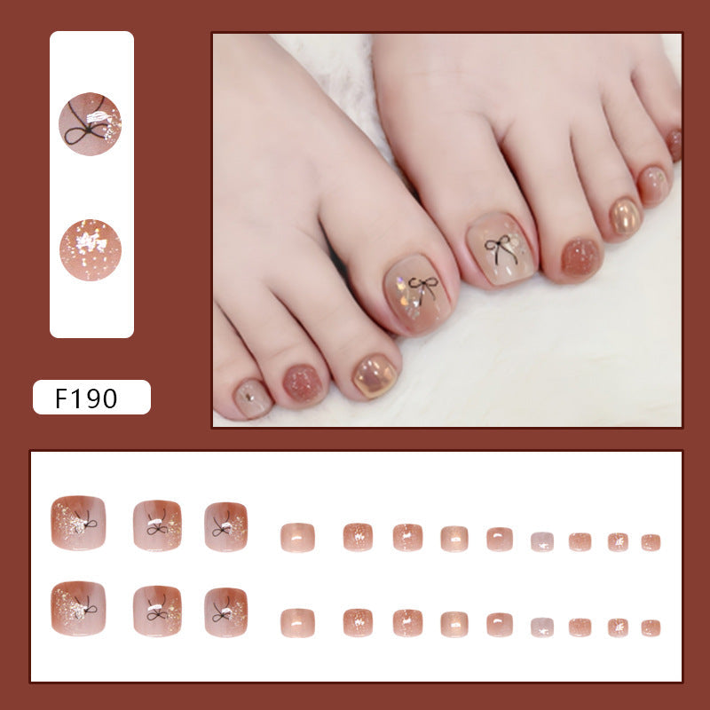 Cocoa Bow Glow 24-piece press-on toenail set