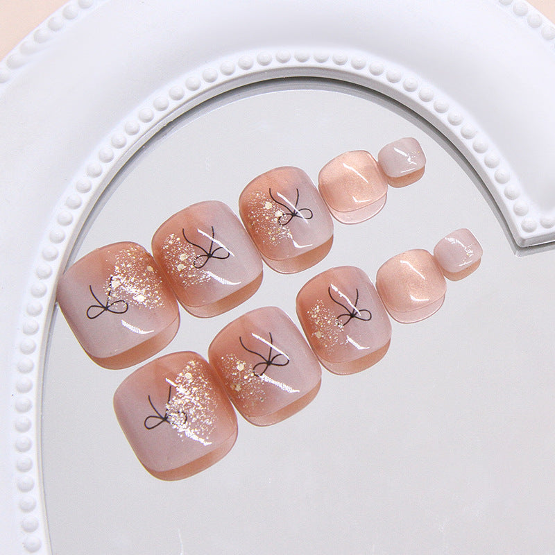 Cocoa Bow Glow 24-piece press-on toenail set