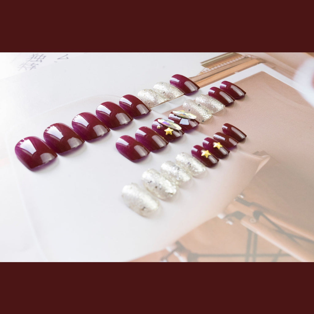 Burgundy Star Shell glossy celestial press-on nails
