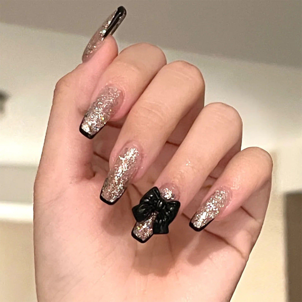 Gilded Noir Bow French black and gold press-on nails
