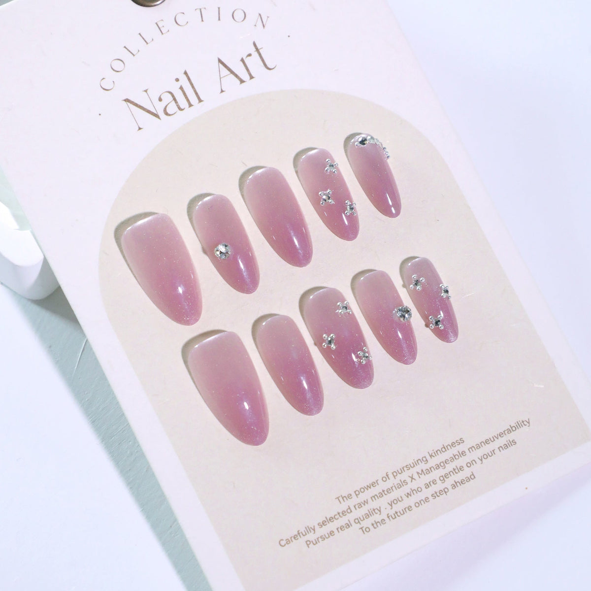 Bare Spark Cat Eye rhinestone almond press-on nails